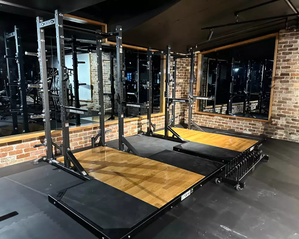 gym on king closeup of squat racks