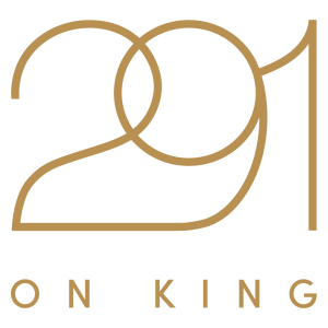 Newcastle based hotel 291 on king's logo consisting of thin gold text on blank background
